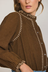 BLUSA MICROPANA CUELLO VOLANTE