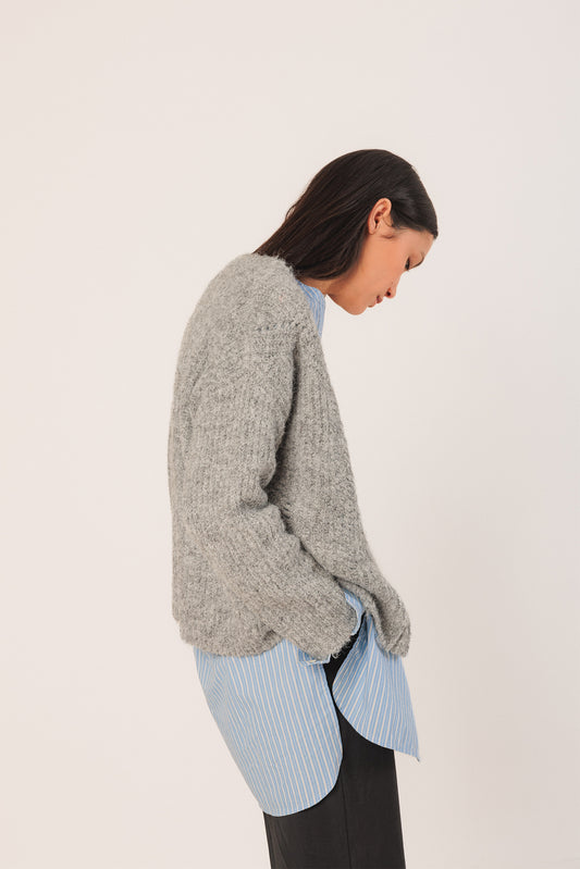 CHAQUETA  CON DETALLES DESAGUJADOS