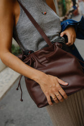 RUCHED-LEATHER SLING BAG