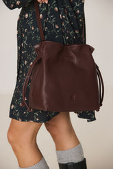RUCHED-LEATHER SLING BAG